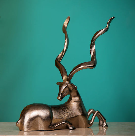 Majestic Sitting Deer Sculpture for Table Tops